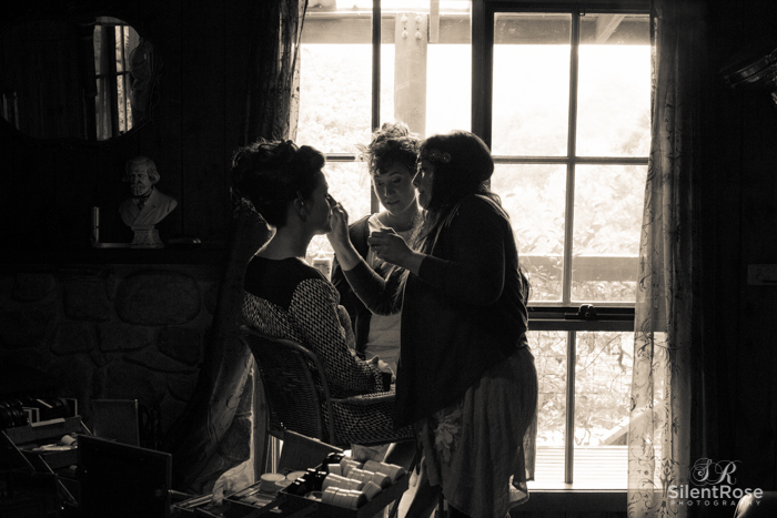 Brooke in window light getting her makeup done